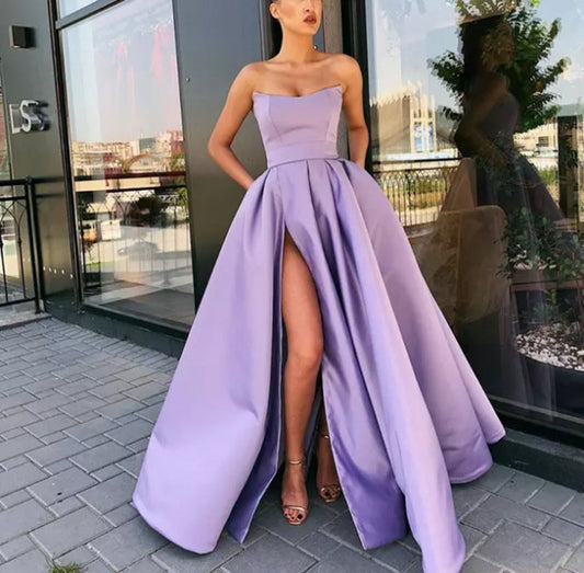 Robe de soirée femme – Bustier structuré – Tissu luxueux – Jupe évasée à fente