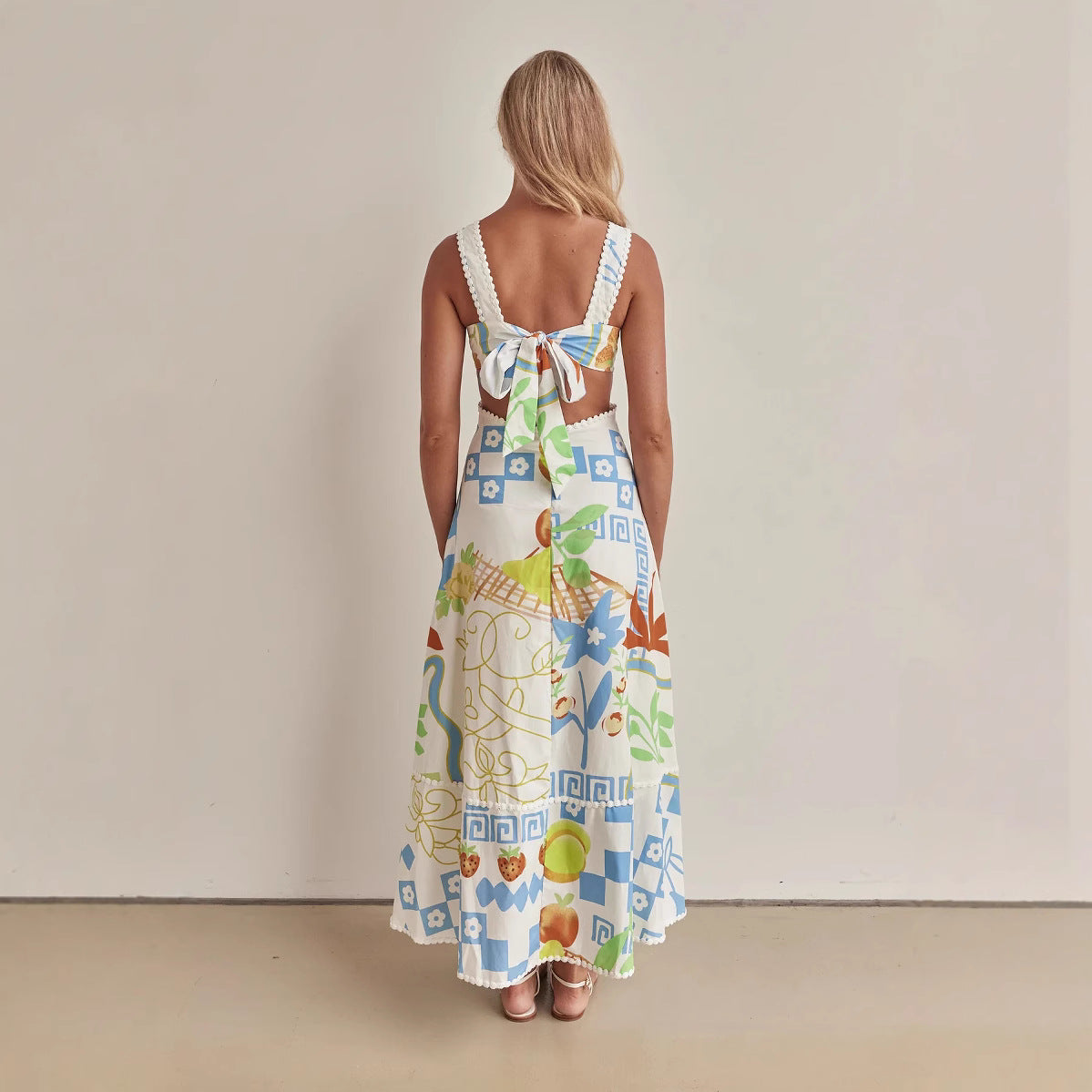 Robe longue femme – Bretelles fines – Décolleté en V – Taille ajourée – Imprimé fluide