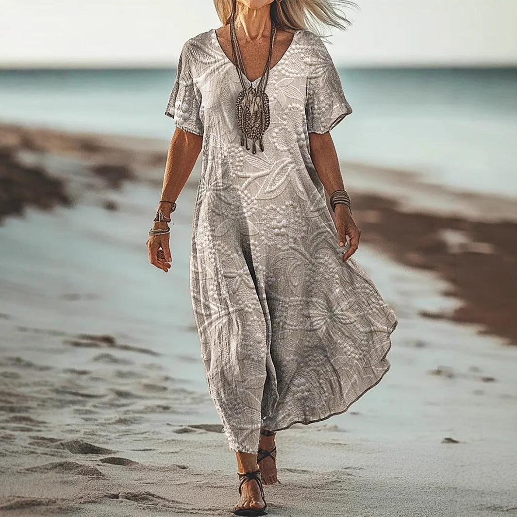 Robe mi-longue femme – Coupe évasée – Col V – Manches courtes – Motif fleuri