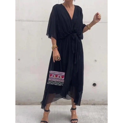 Robe longue femme – Tissu fluide – Manches chauve-souris – Taille nouée – Ourlet asymétrique