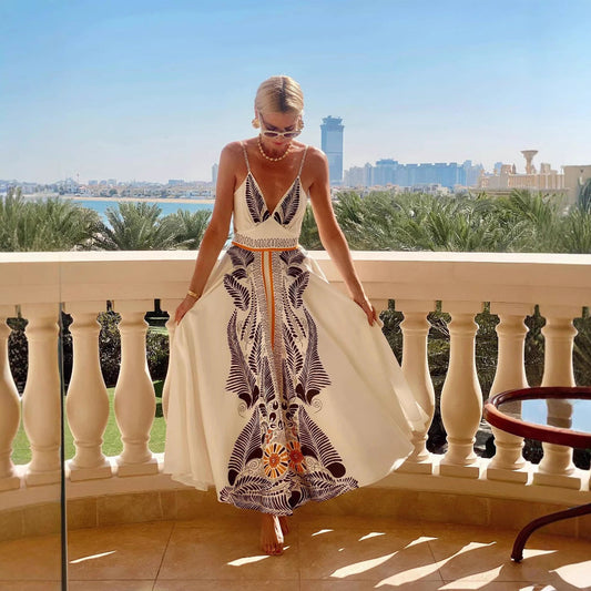 Robe longue femme – dos nu – coupe fluide – imprimé élégant