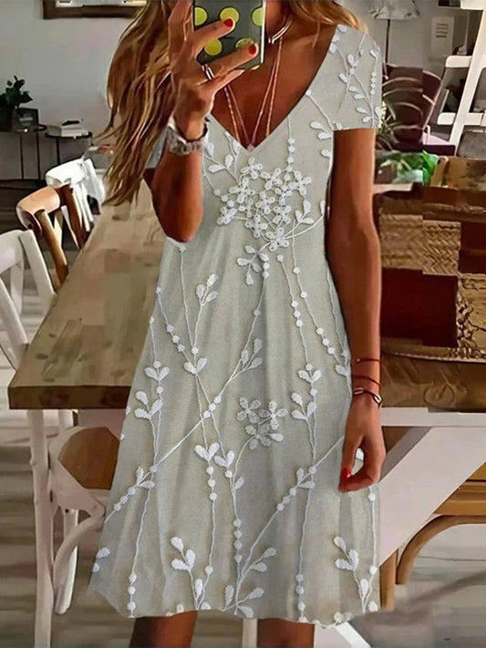 Robe courte femme – Col V – Coupe évasée – Manches courtes – Tissu respirant – Imprimé feuilles