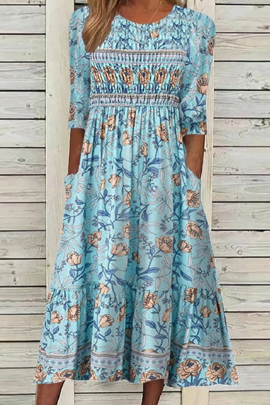 Robe Midi Femme – Coupe Décontractée – Motif Fleuri – Tissu Respirant Doux – Manches Mi-longues – Corsage Smocké – Jupe Volantée – Poches Pratiques