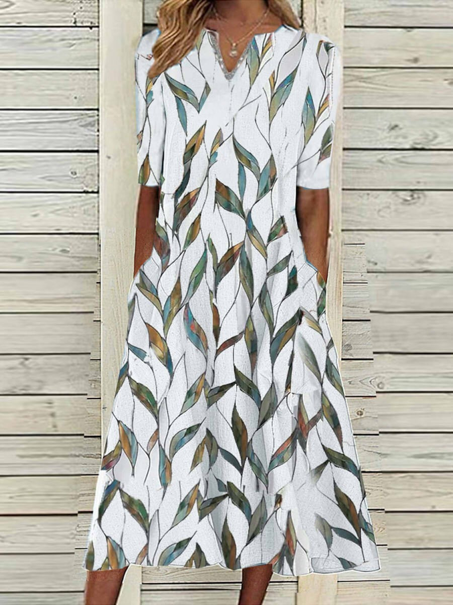 Robe midi femme – Coupe fluide – Imprimé feuillage – Tissu respirant – Manches mi-longues – Poches latérales