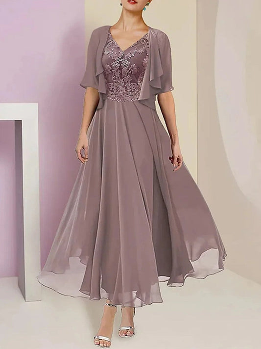 Robe longue femme – Tissu luxueux – Coupe fluide – Manches 3/4 – Décolleté en V brodé