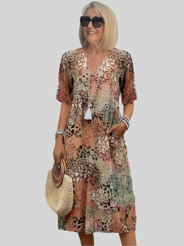 Robe midi femme – Coupe fluide – Col en V – Manches courtes – Imprimé abstrait – Poches